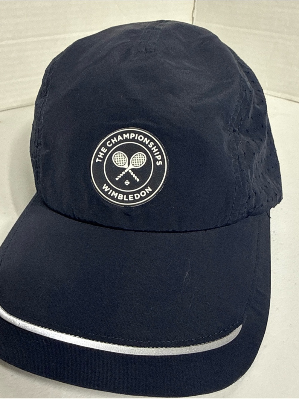 Wimbledon Navy Adjustable Performance Cap with White Lettering
